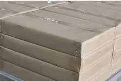 Finished backup board pallets staged for a scheduled container